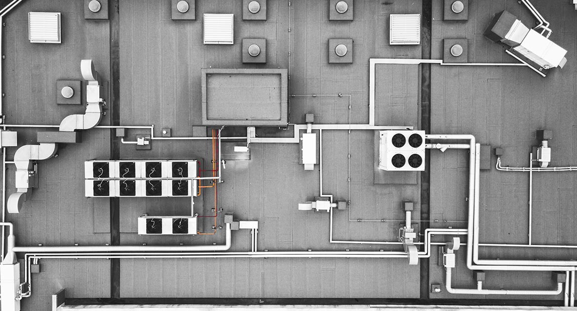 Bird’s eye view of rooftop gravity ventilator accessories