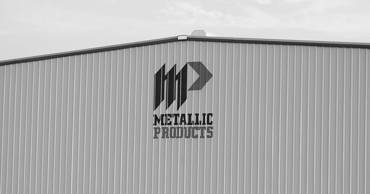 Metallic Products logo on building