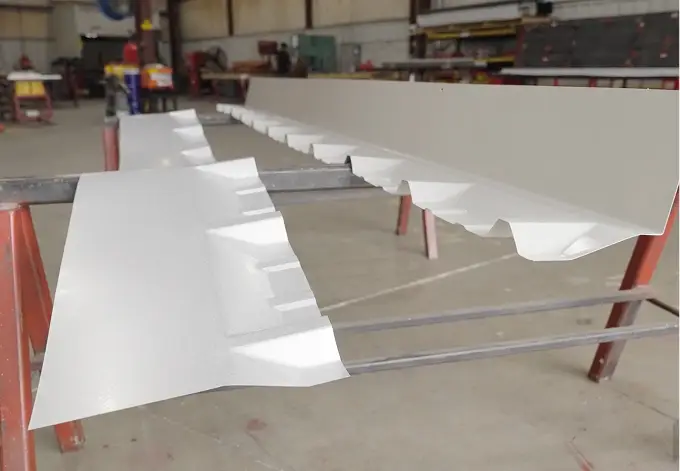 White metal building flashing in Metallic Products manufacturing facility