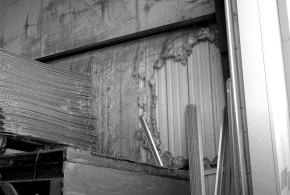 Deteriorated insulation inside steel building